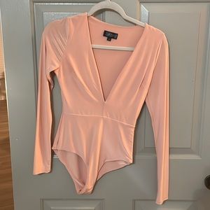 NEW WITHOUT TAG DASH BODY SUIT SIZE S